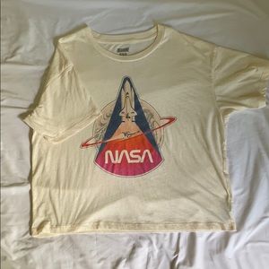 Cream-colored graphic tee with NASA logo
